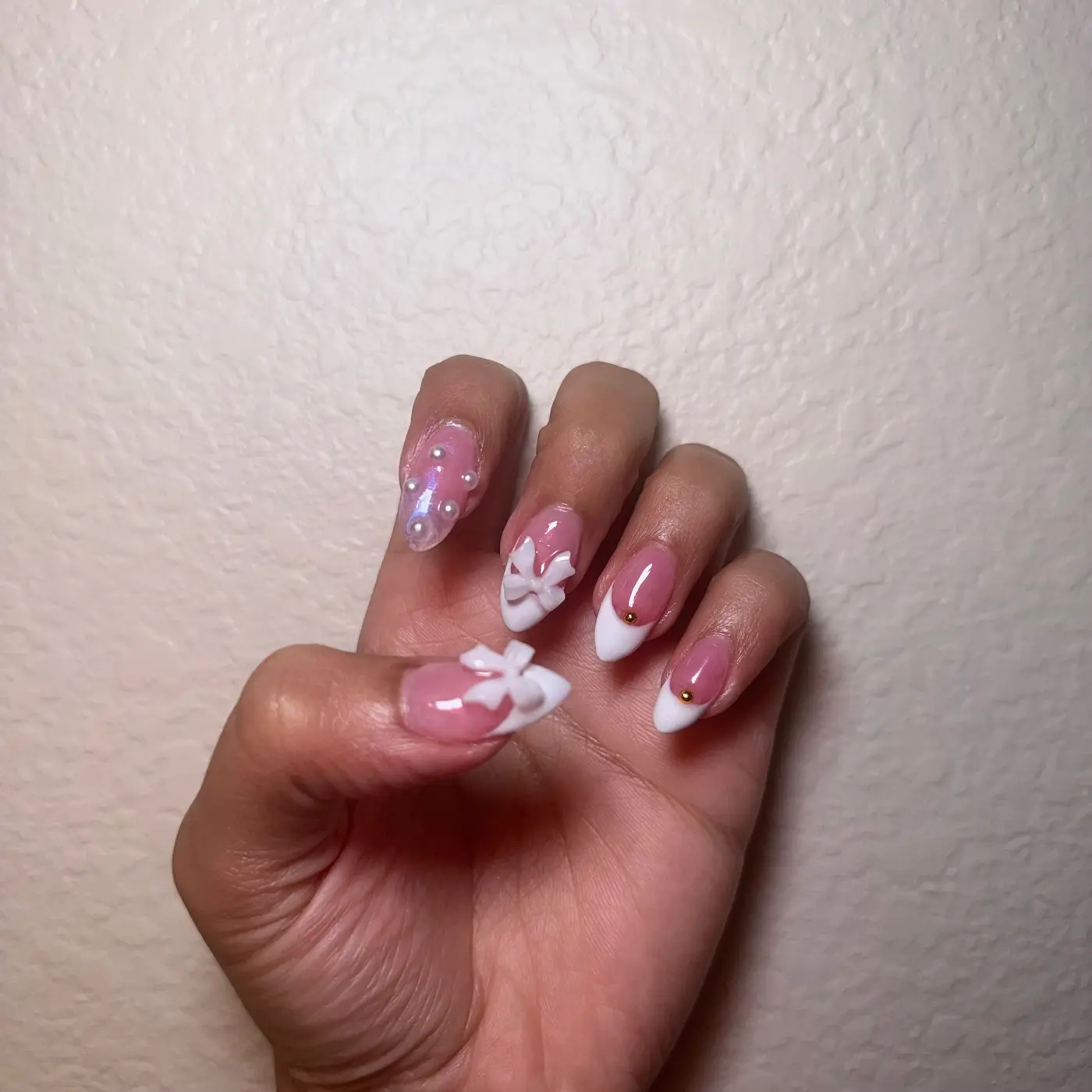 Soft pink almond set with 3D white bows and pearl detail